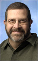 Associate professor at the Missouri School of Journalism,<br /> Charles N Davis