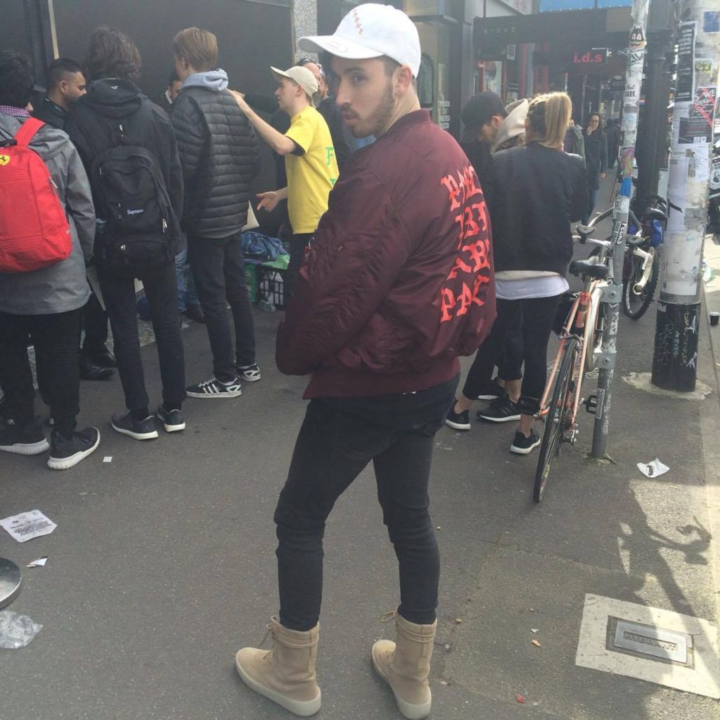Erdeg in his West attire outside the Melbourne pop up store
